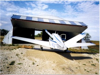 N61JC in front of completed hangar